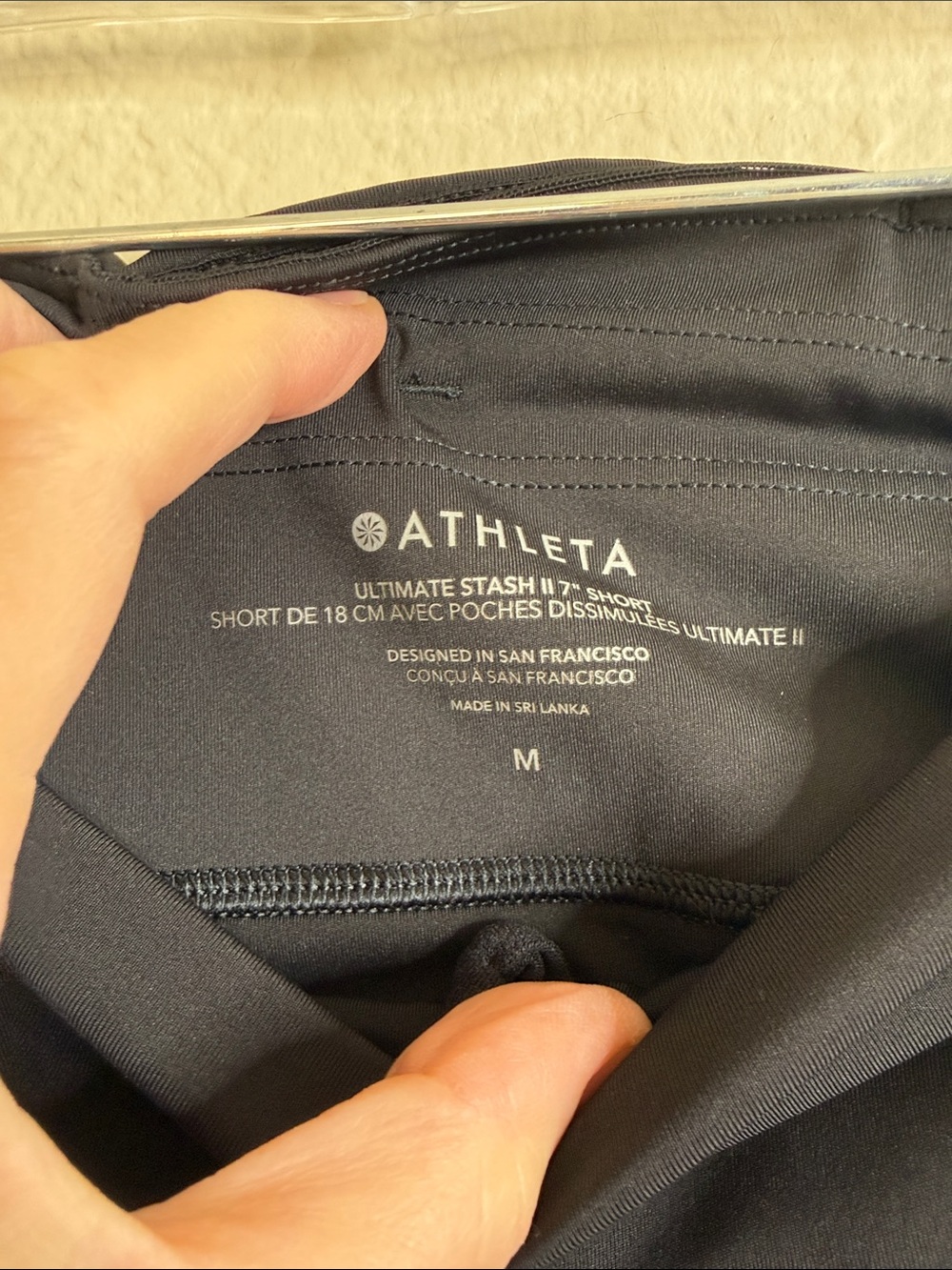 Athleta Ultimate Stash II 7” short black medium EUC - Picture 2 of 4